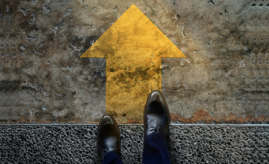 Start and Challenge Concept. a Business Man on Formal Shoes Steps to Follow a Yellow Arrow, Get Ready to Moving Forward or take a Chance to Success. Top View